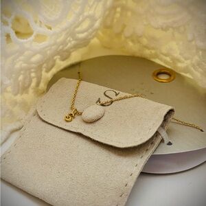 Elegant gold plated necklace with Cream Suede pouch